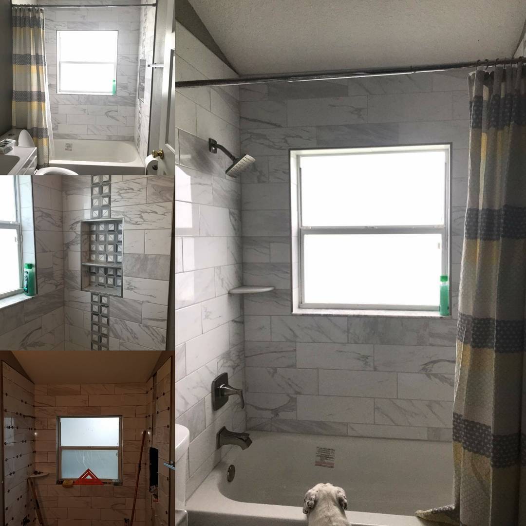 Finished guest bathroom shower with porcelain tile and new plumbing