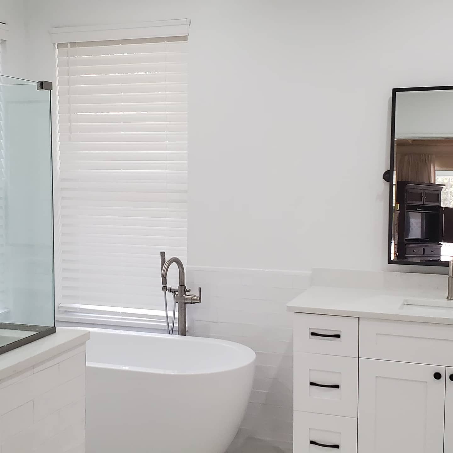 Master bathroom remodel with new tile and fixtures — Tampa Bay